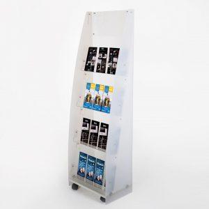 A white frosted sided clear acrylic brochure stand with black castor wheels and 4 shelves and brochures on display.