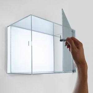 Wall mounted Illuminated display Case with lockable front door.
