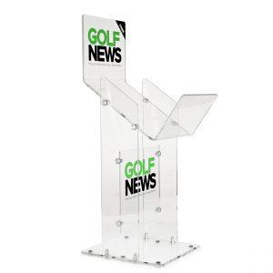 A clear acrylic newspaper stand with custom branding.