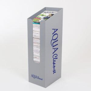 A grey metal dump bin with custom printing on the front and sides.