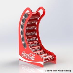 A curved red coca cola branded gravity fed drinks can dispenser holding coca cola cans.