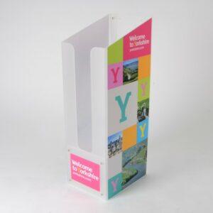 A custom printed, frosted acrylic dump bin with "welcome to Yorkshire" printing.