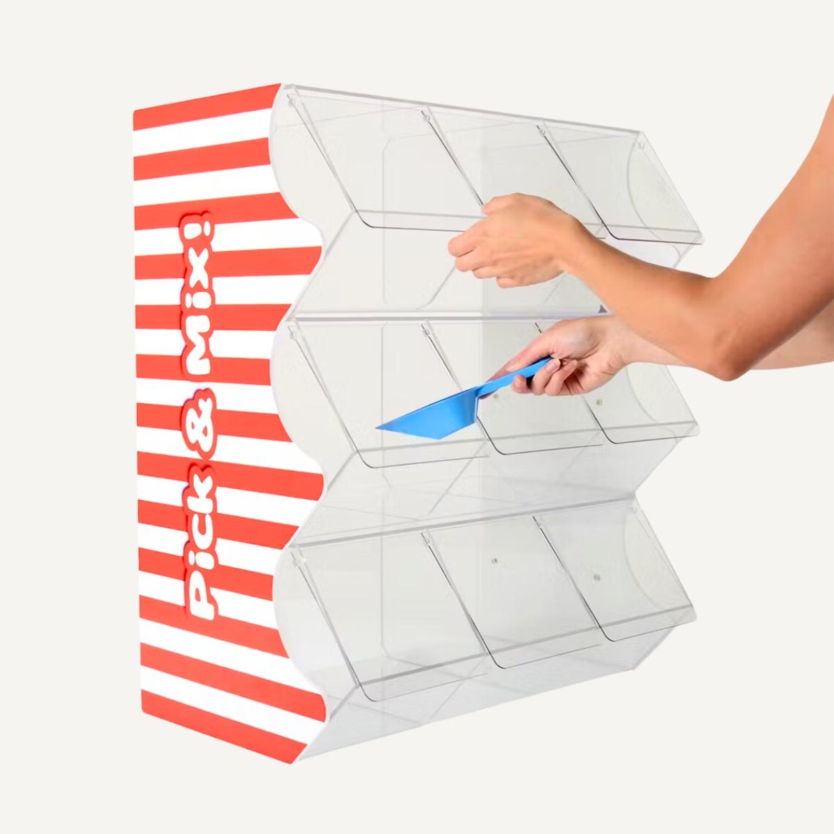 Pick & Mix bins with red and white stripes on the sides.