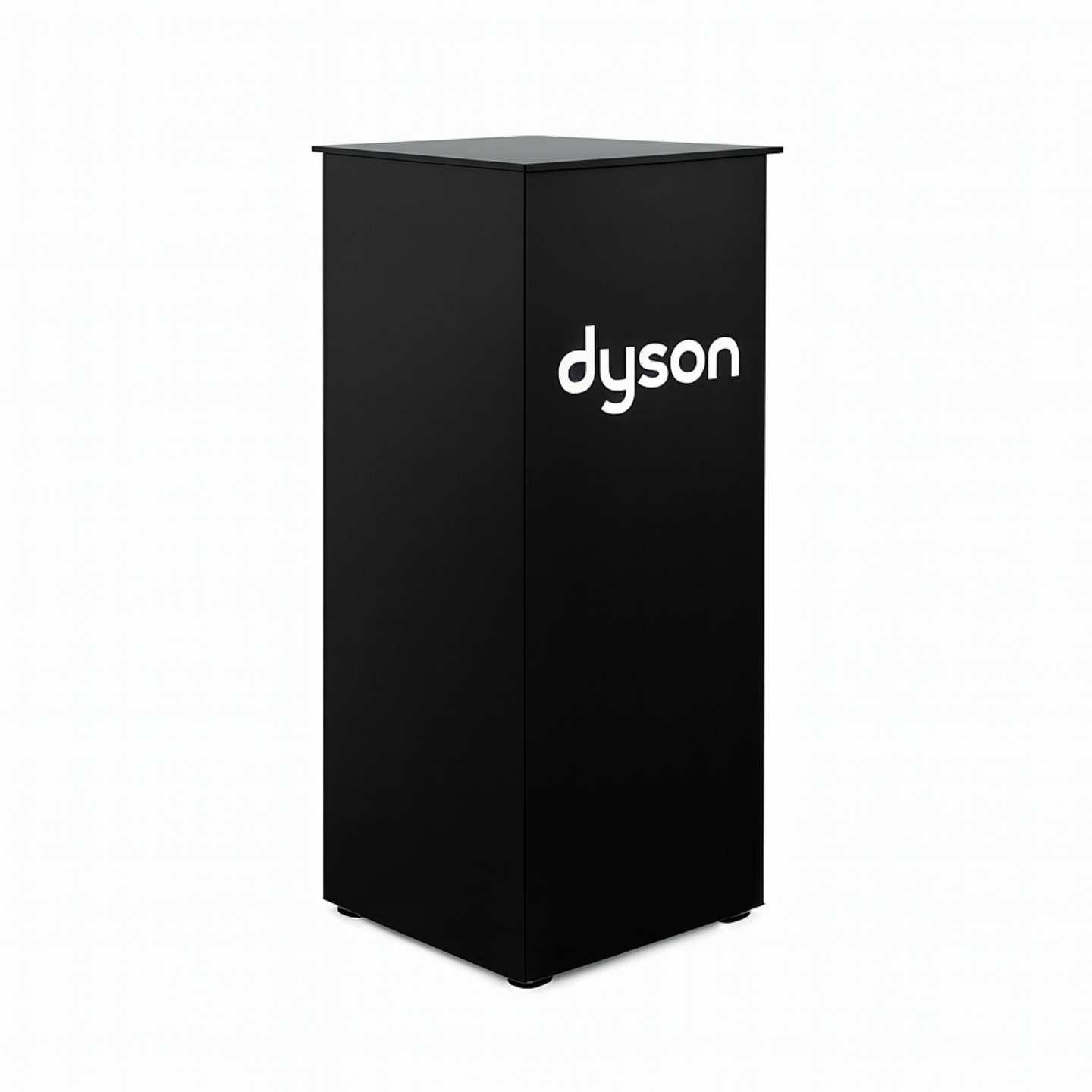 A black flat pack aluminium and acrylic plinth with dyson branding on the front.