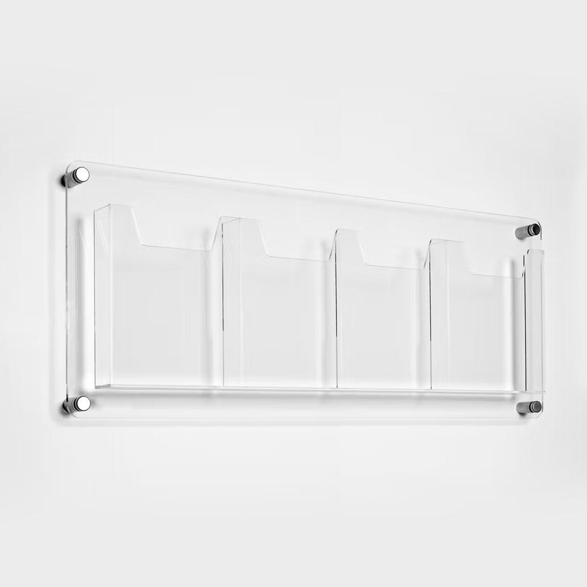 Clear acrylic wall mounted leaflet holder with four A4 pockets.
