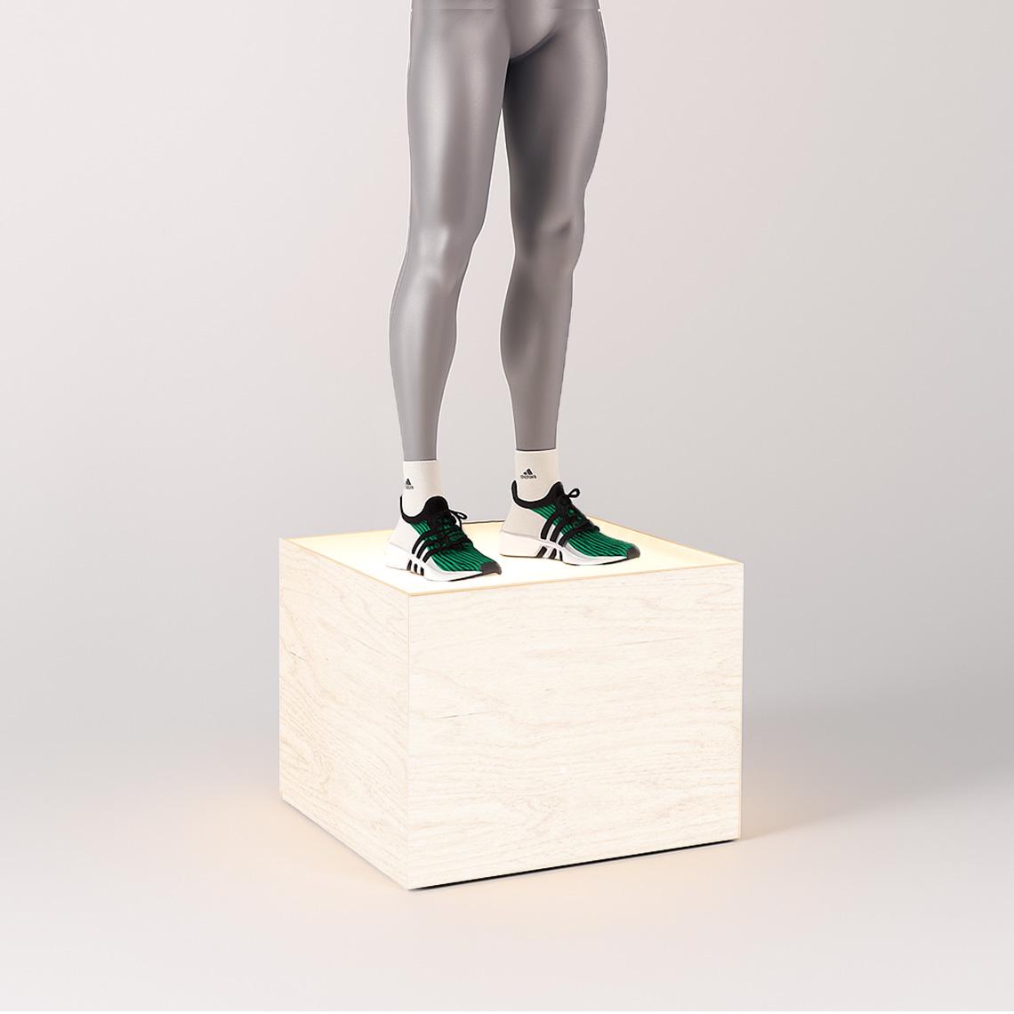 Illuminated plywood display plinth showcasing a mannequin with Adidas sneakers. The glowing top surface highlights footwear or retail displays, ideal for visual merchandising, exhibitions, or store interiors with a clean, modern presentation