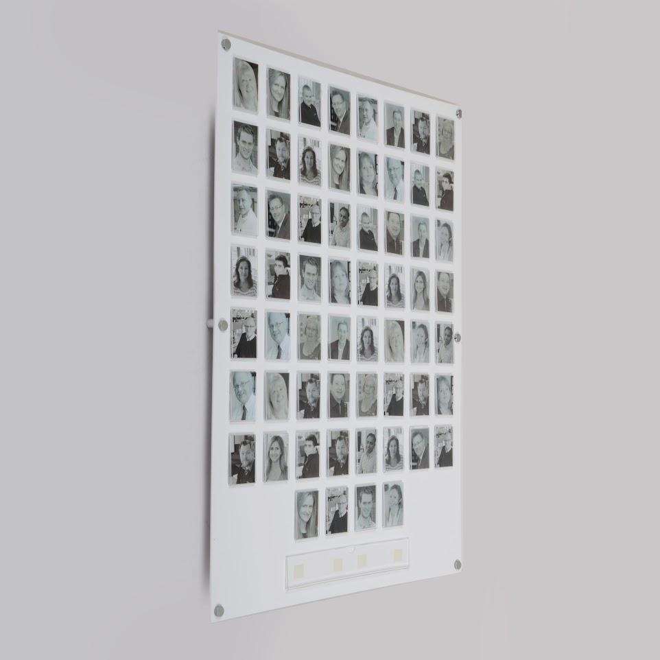 A clear acrylic 60 pocket staff photo board.