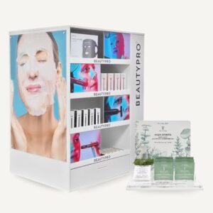 Floor-standing beauty shelving merchandiser with illuminated skincare product displays alongside a countertop beauty product glorifier for retail presentation.