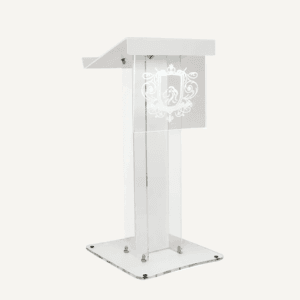 A modern acrylic lectern with an illuminated, ornate etched logo on the front, featuring a sleek and minimal design.