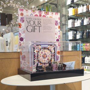Product feature display case with interchangeable graphics slots.