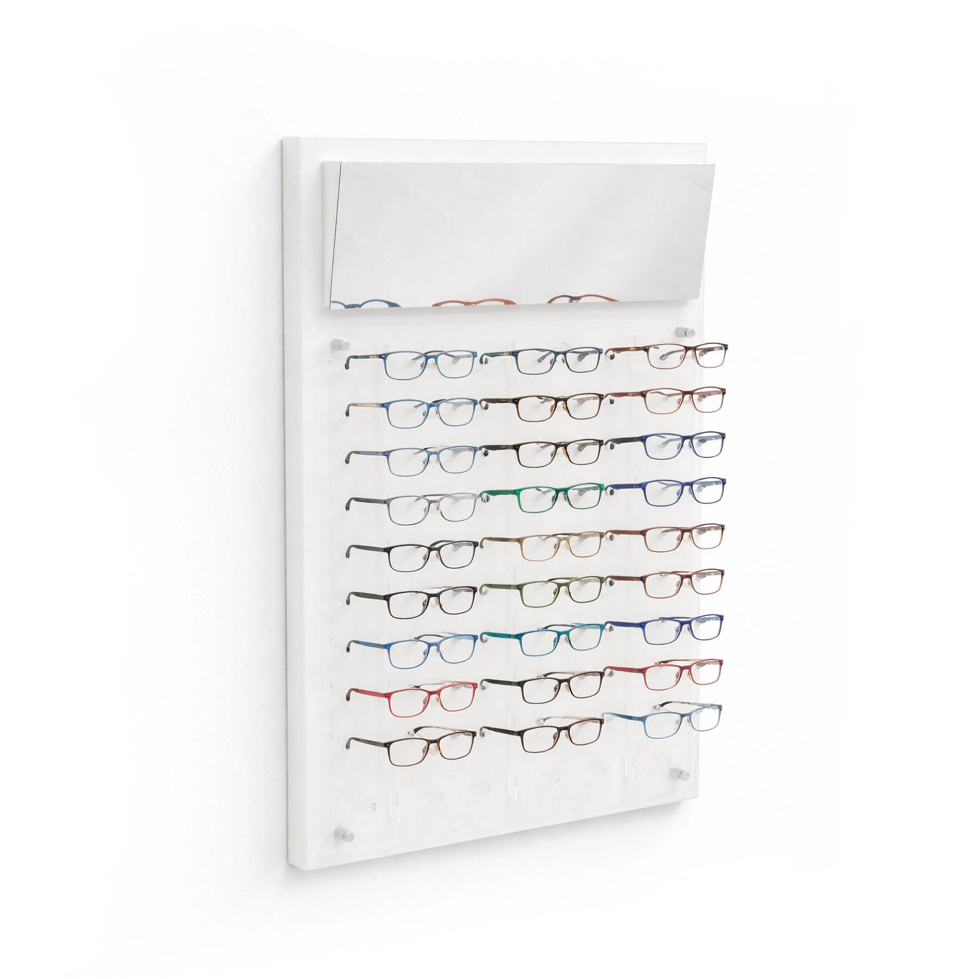 Wall-mounted white optical glasses display board with mirror, featuring 30 pairs of eyeglass frames on clear acrylic holders, modern retail eyewear display unit
