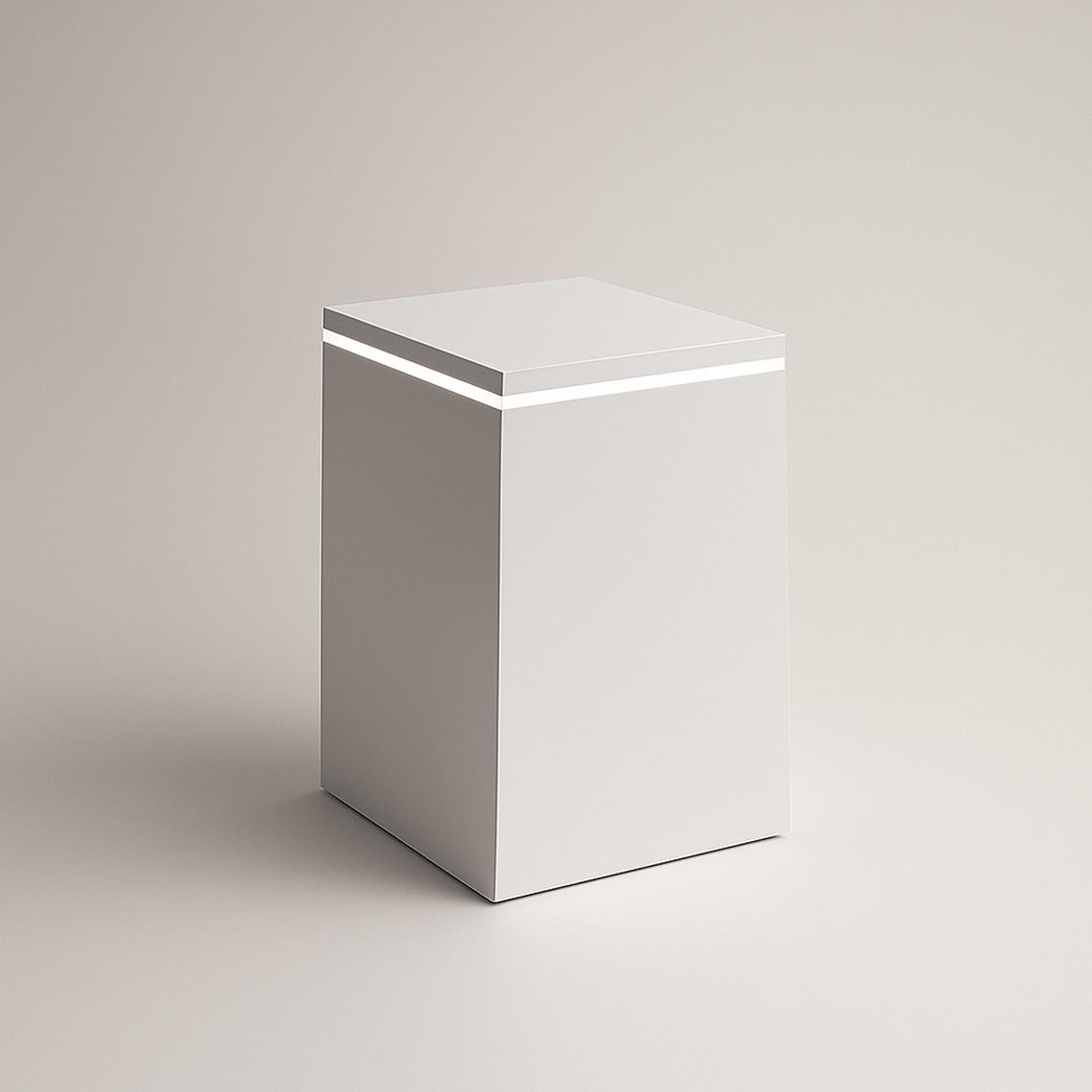 Single white satin display plinth with integrated LED light strip positioned just below the top surface, shown in a minimalist neutral studio.