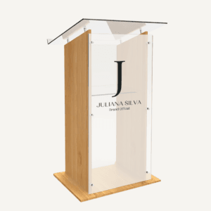 Image of Luminati's Executive Presentation Lectern with shelf, featuring a light oak wood finish and frosted clear acrylic front panel with logo "Juliana Silva".