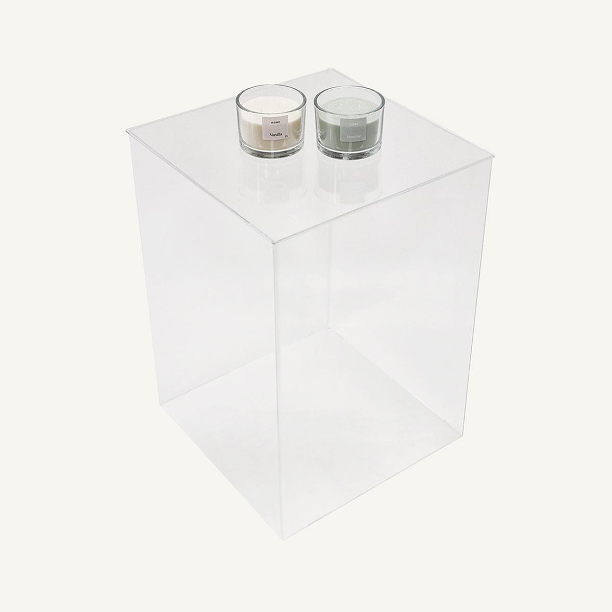 Top view of Clear Acrylic Display Plinth with two candles on top.