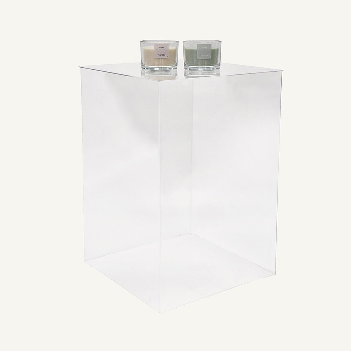 Clear Acrylic Display Plinth with two candles displayed on top.