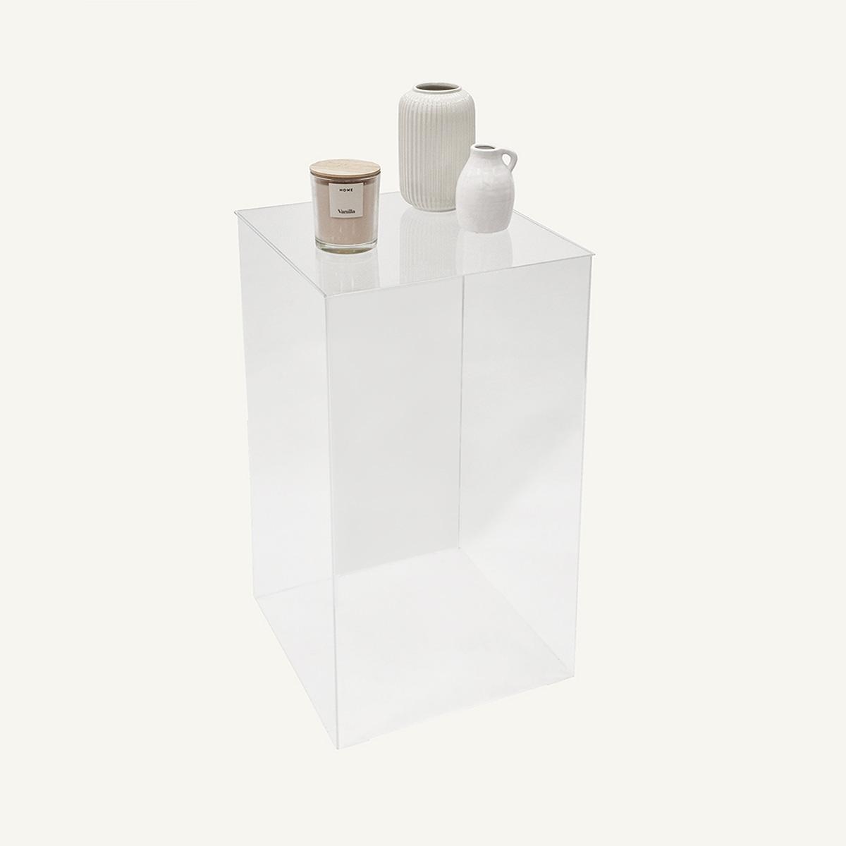 Clear Acrylic Plinth with vase and candles on display top view.