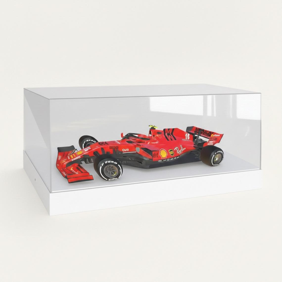 A 1:8 F1 Ferrari model car display case with a white base and a model car on display.
