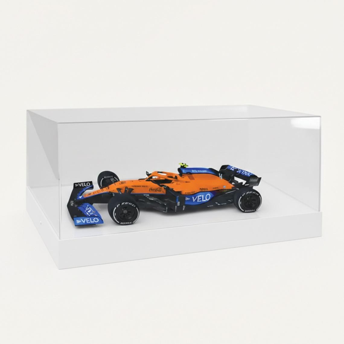 A 1:18 McLaren F1 Model Car Display with a white base and a F1 model car on display.