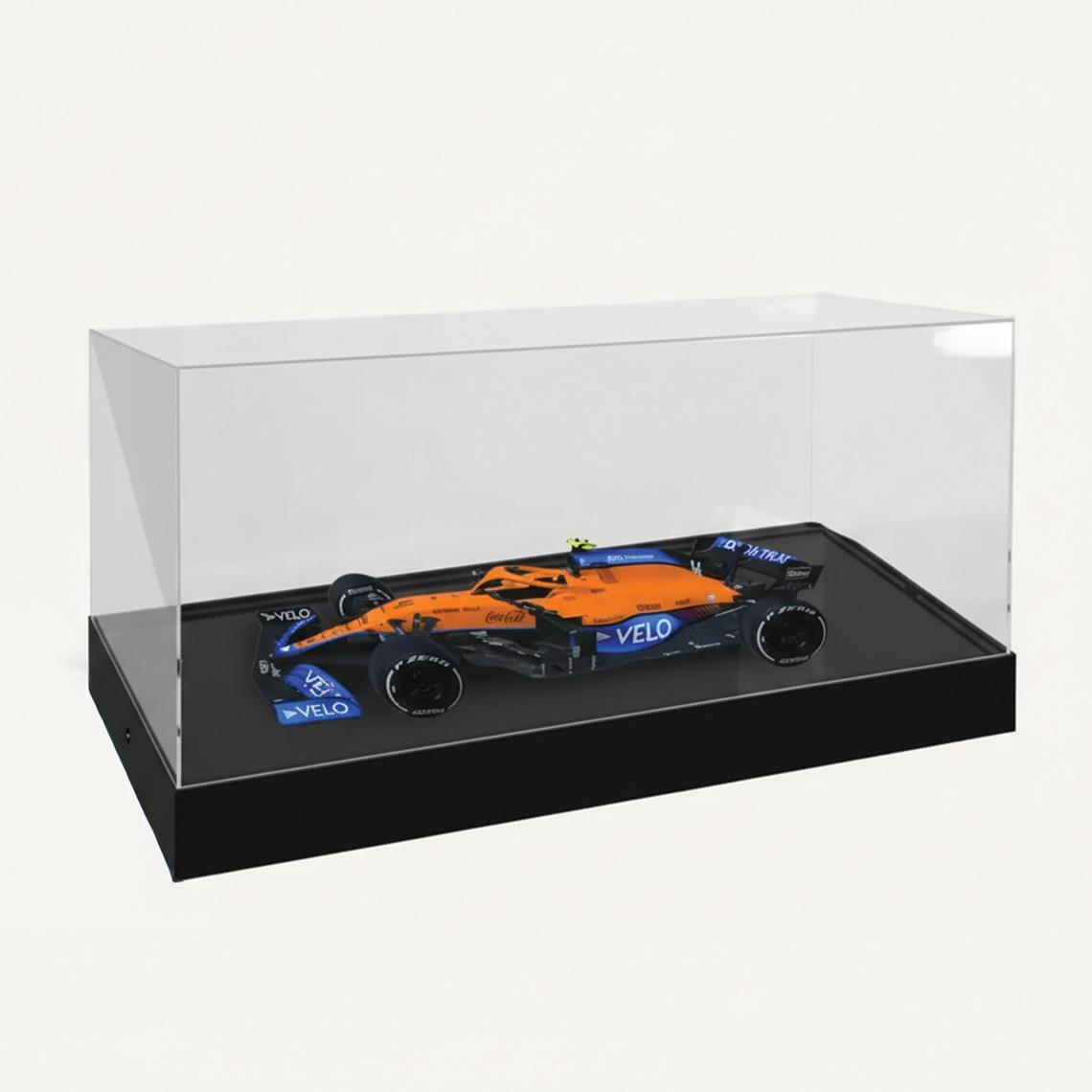A 1:8 McLaren F1 Model Car Display Case with a black base and a model car on display.