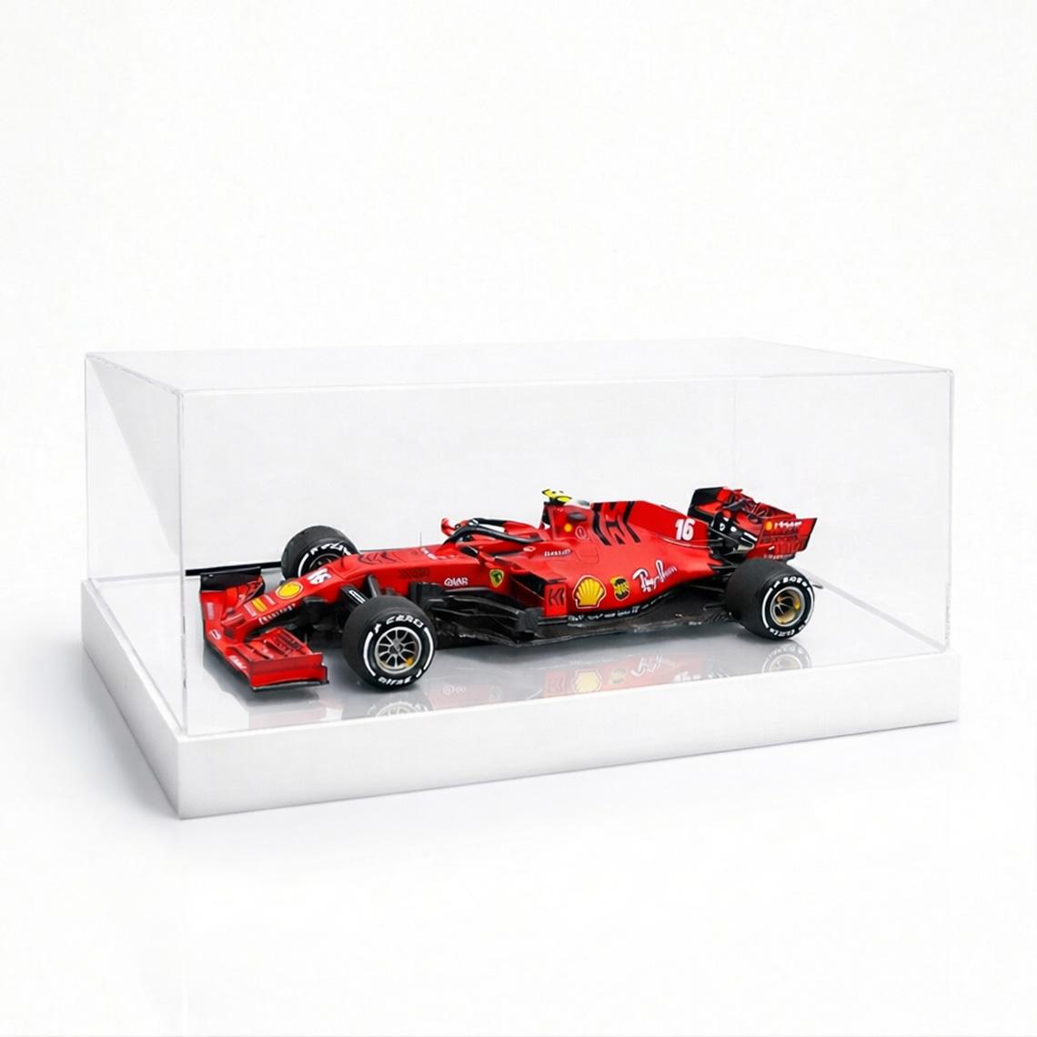 A 1:8 F1 Ferrari model car display case with a White base and a model car on display.
