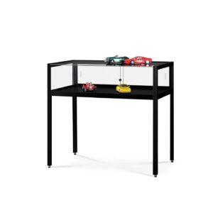 A black Fortuna showcase table with decorative objects placed inside and on top.