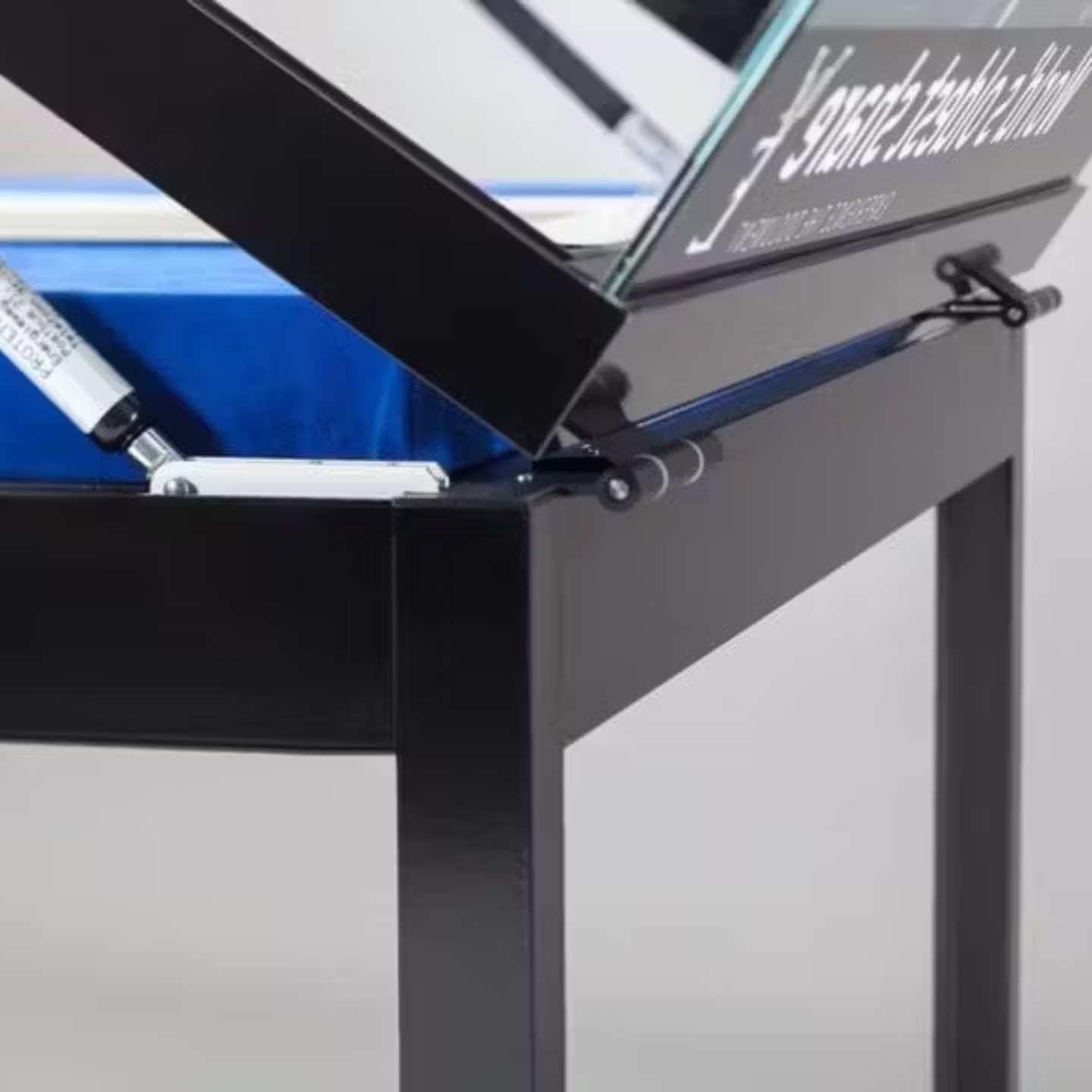 A close up of a black showcase table.