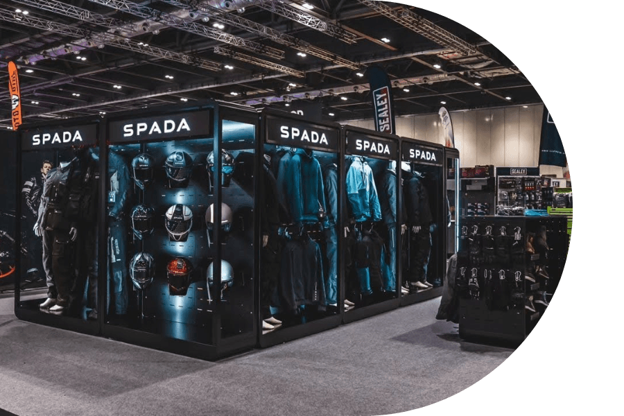 Clothing display in exhibition setting.