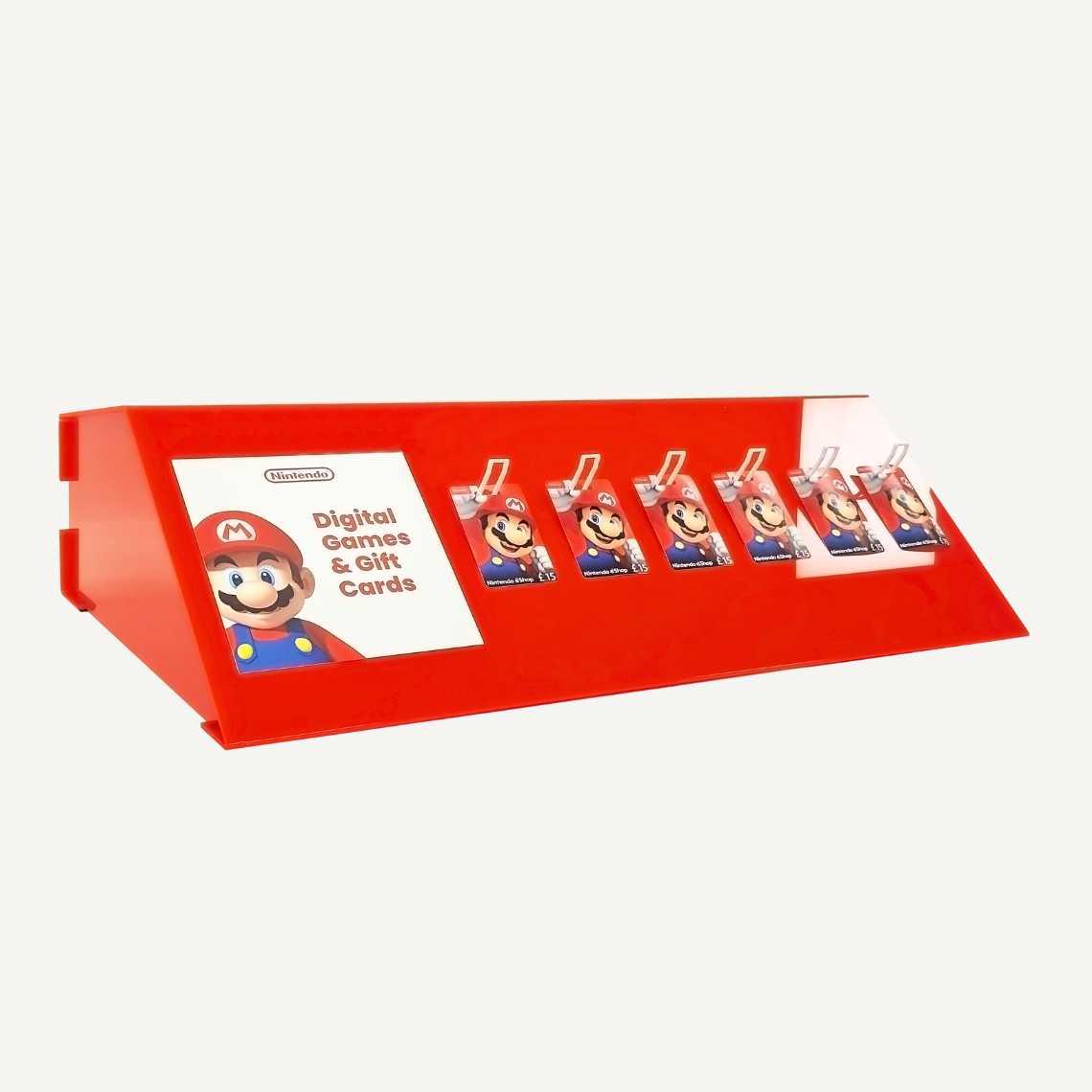 A Nintendo gaming POS display holding Super Mario Nintendo EShop giftcards.