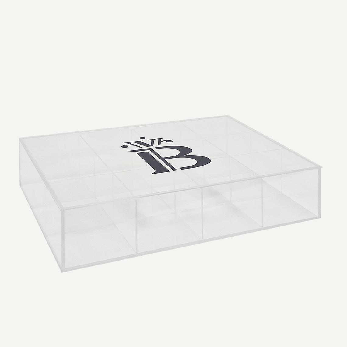 A custom acrylic storage box laid flat with a banana split logo on the front.
