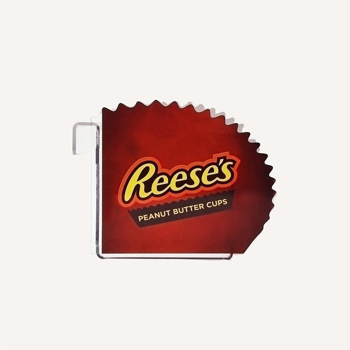 A side on view of a A side view of a Reese's peanut butter cup retail product display.