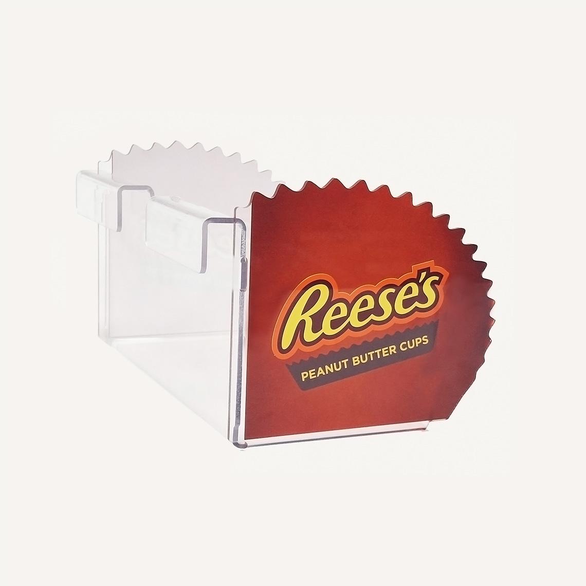 An angled side view of a Reese's peanut butter cup retail product display.