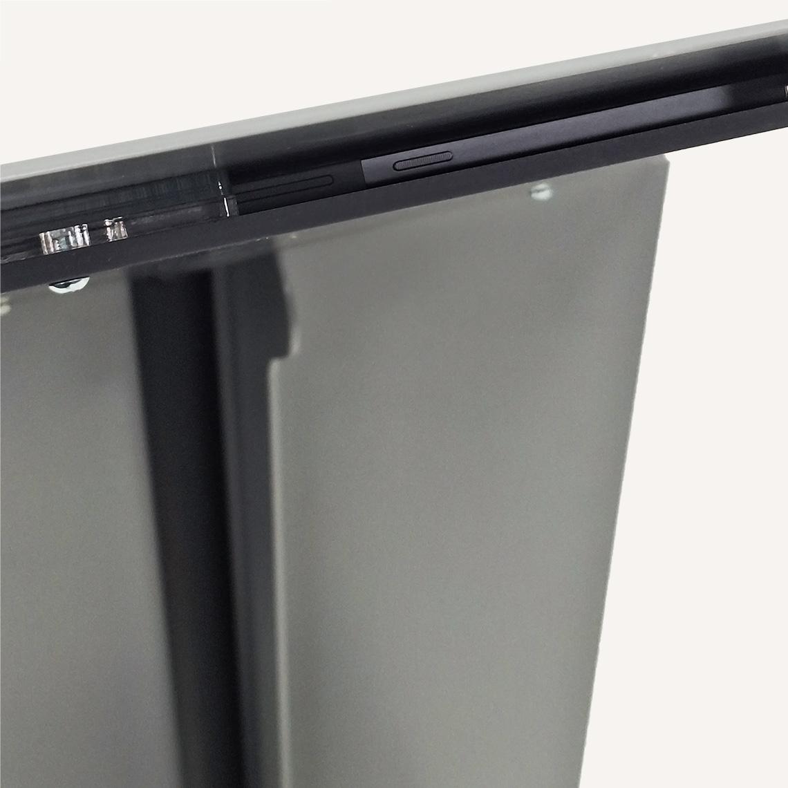 A close up of the top button on a digital silent salesman information kiosk.