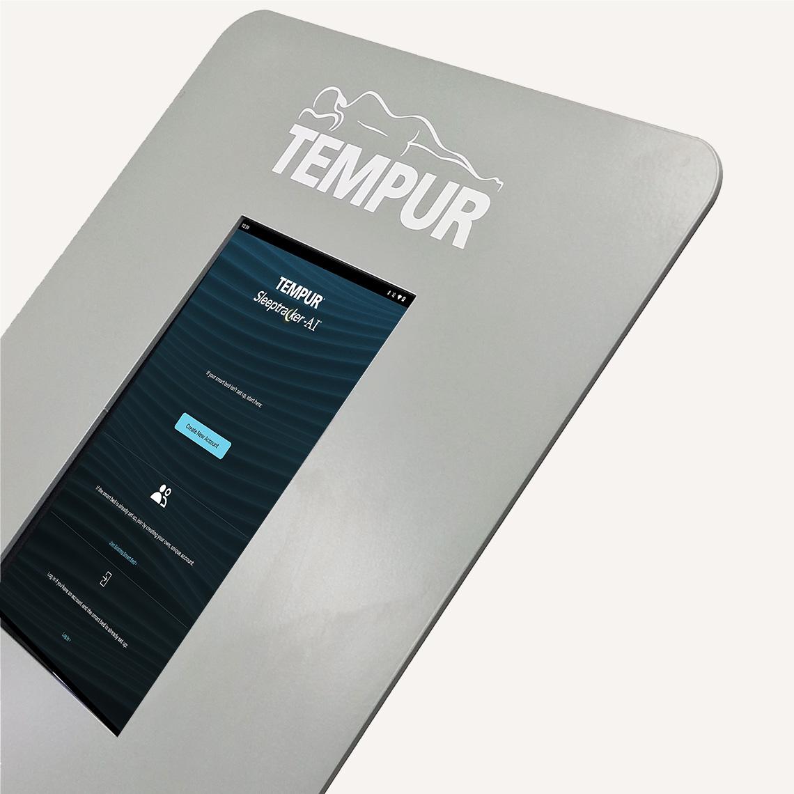 A close up of a digital silent salesman information kiosk digital screen with Tempur branding.