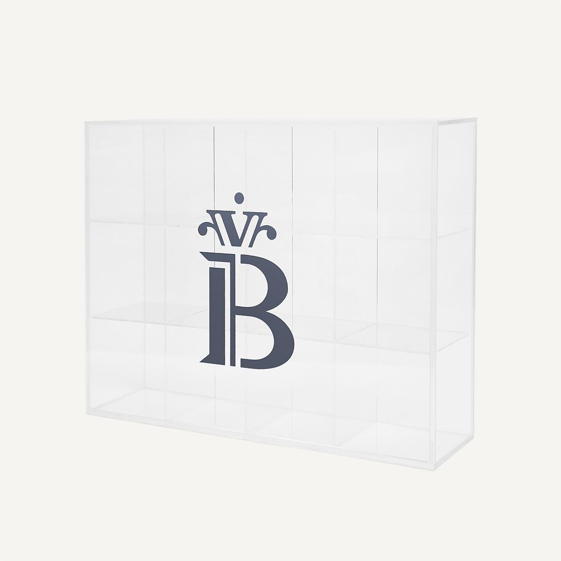 An upright custom acrylic storage box facing left, with a banana split logo on the front.