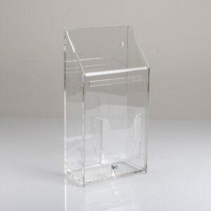 A clear acrylic ballot box.