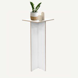 White Plywood Pedestal with Plant and candles on display.