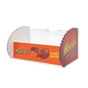 A bespoke Reece's parasite display with orange branding.