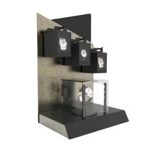 A countertop watch display holding some watches.