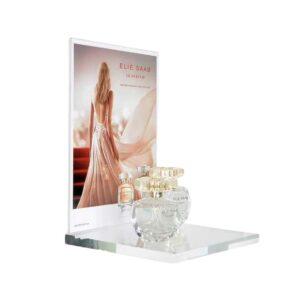 A perfume glorifier for a countertop featuring a customised header and perfume.