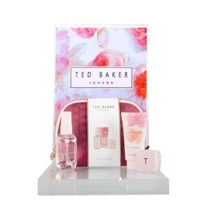 A ted baker countertop product glorifier featuring perfume and skincare items.