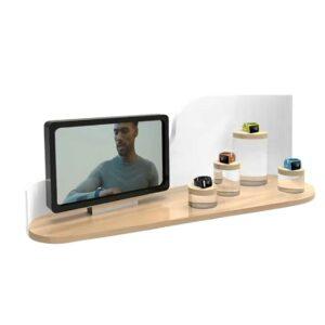 A tabletop product glorifier featuring products next to a digital screen.