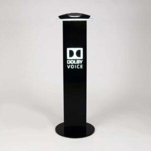 A black illuminated Dolby Sound plinth.