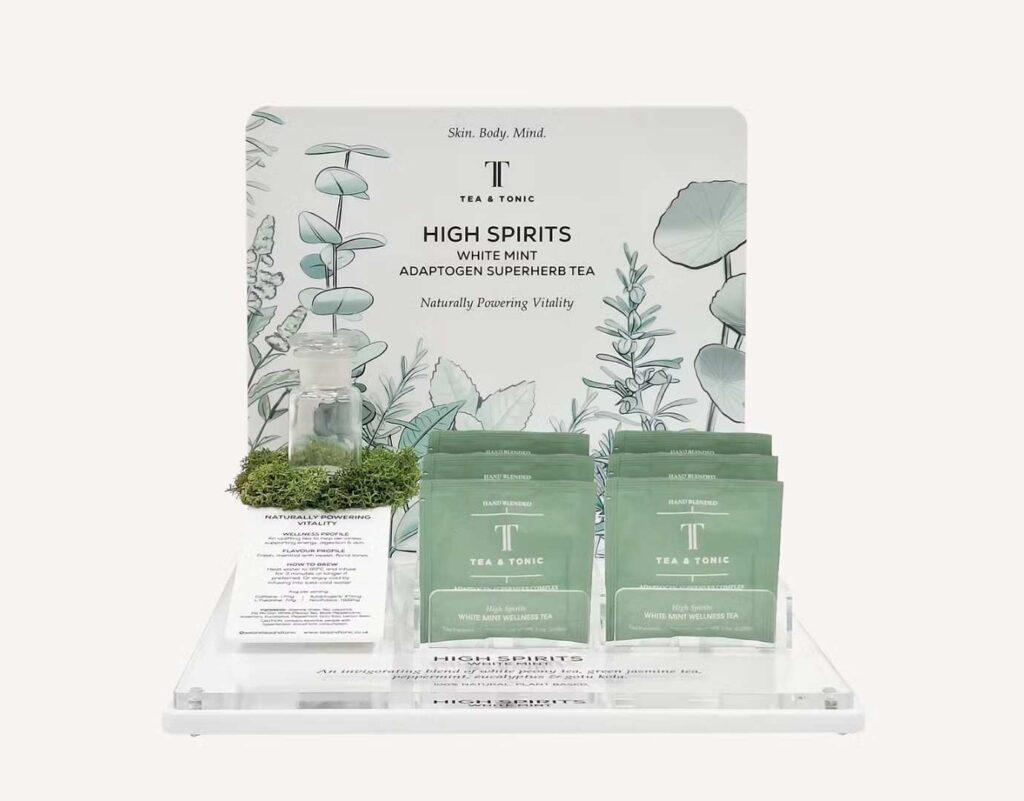 A custom Tea and Tonic product glorifier display with teas on display.