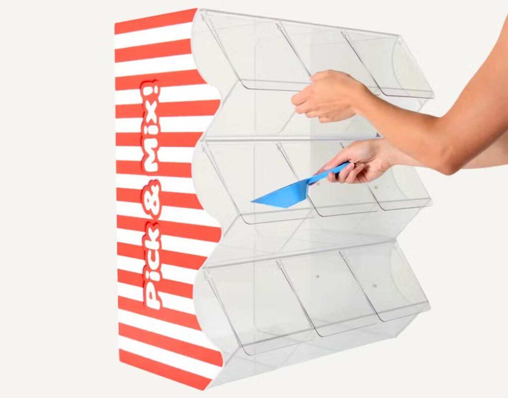 A pick and mix unit with detachable sides.