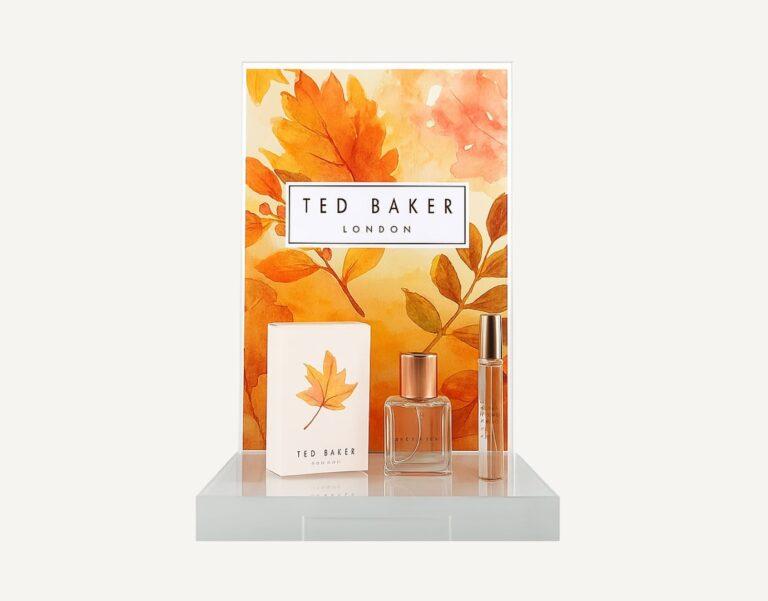 A Ted Baker countertop perfume glorifier with perfumes on display.