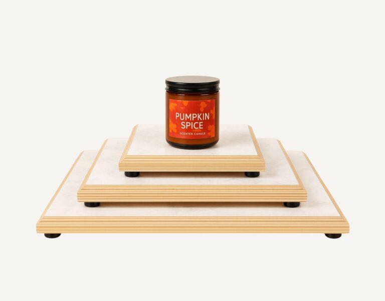 A wooden countertop product display riser.