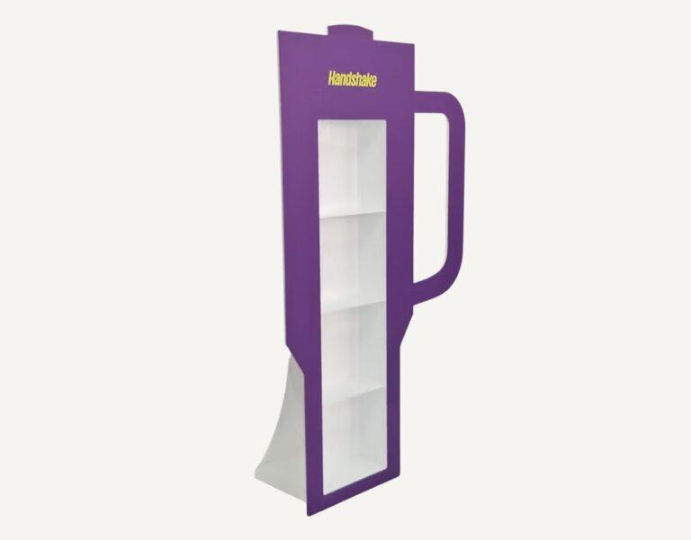 A purple freestanding bottle display in the shape of a flask.
