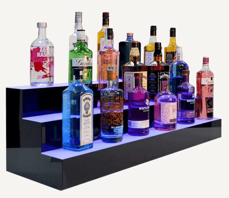 An illuminated, tiered, colour changing drinks shelf.