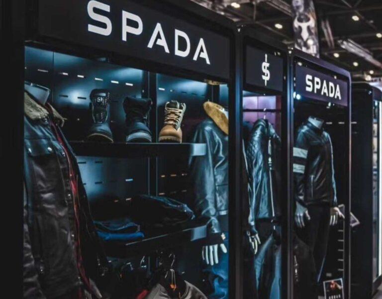A custom exhibition display for spada, with clothing on display.