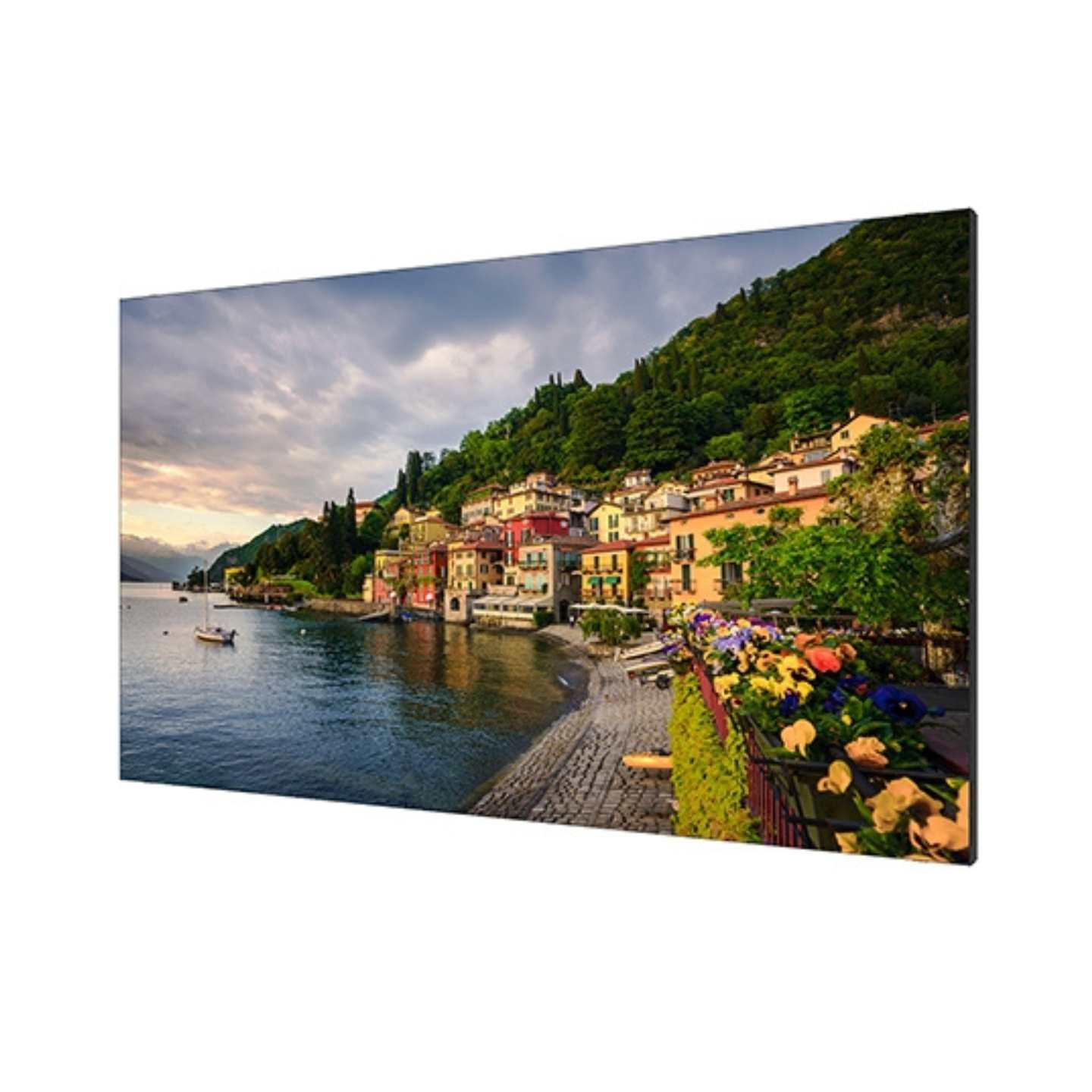 An ultra narrow bezel LCD video wall display with a beach side town on the screen.